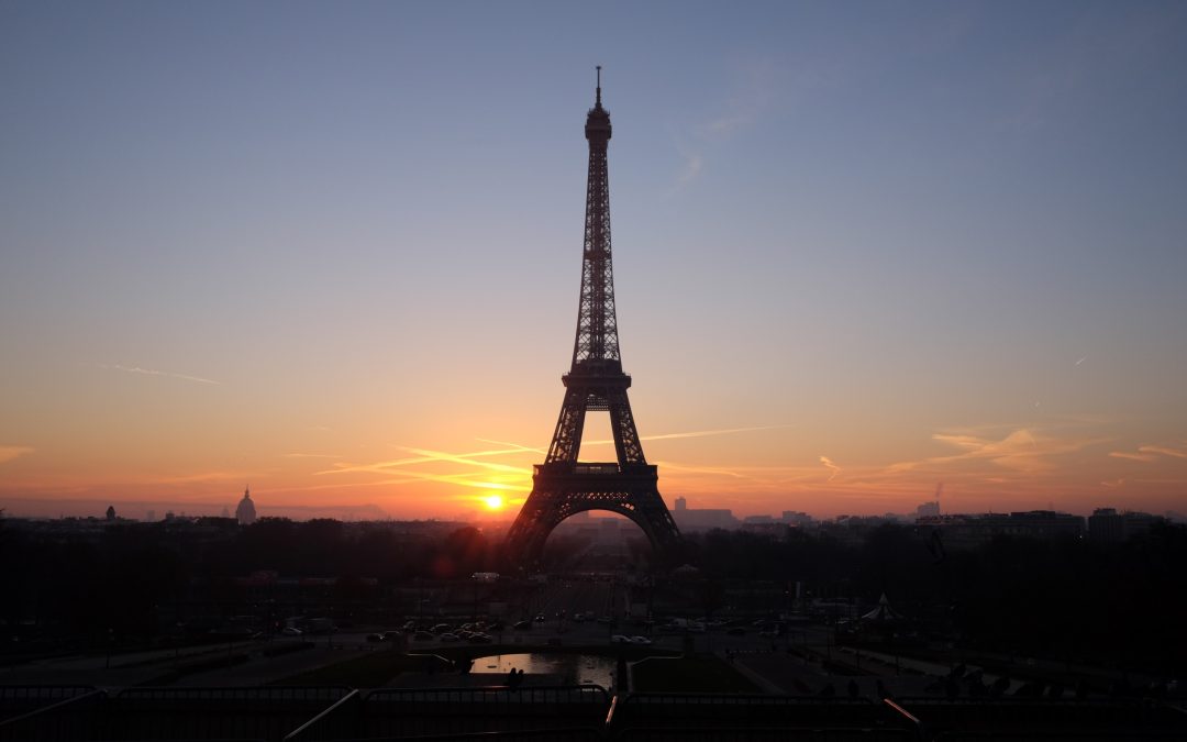 Which well-known watchmaker’s identify is on the Eiffel Tower?