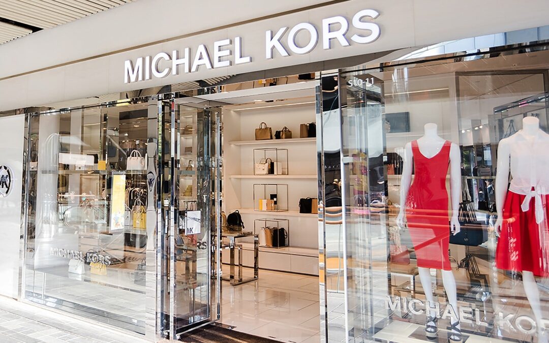 Michael Kors Dad or mum Capri Lowers Annual Income Forecast